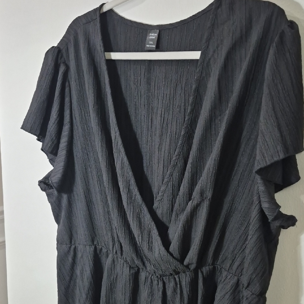 Elegant Black Wrap Blouse - Picture 3 of 10